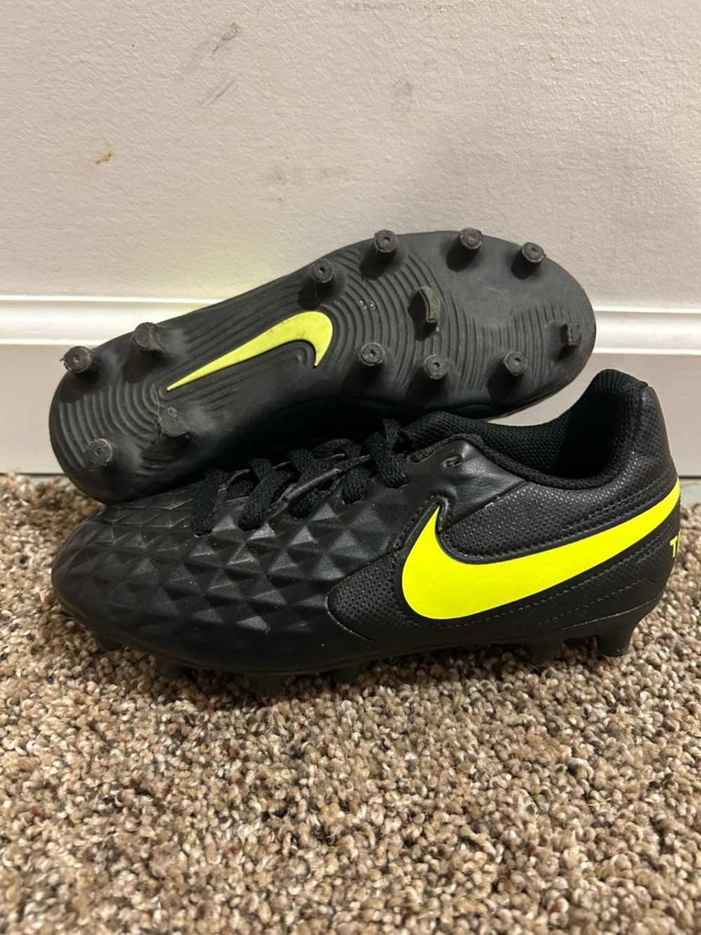 Nike Black Soccer Cleats with Neon Yellow Swoosh